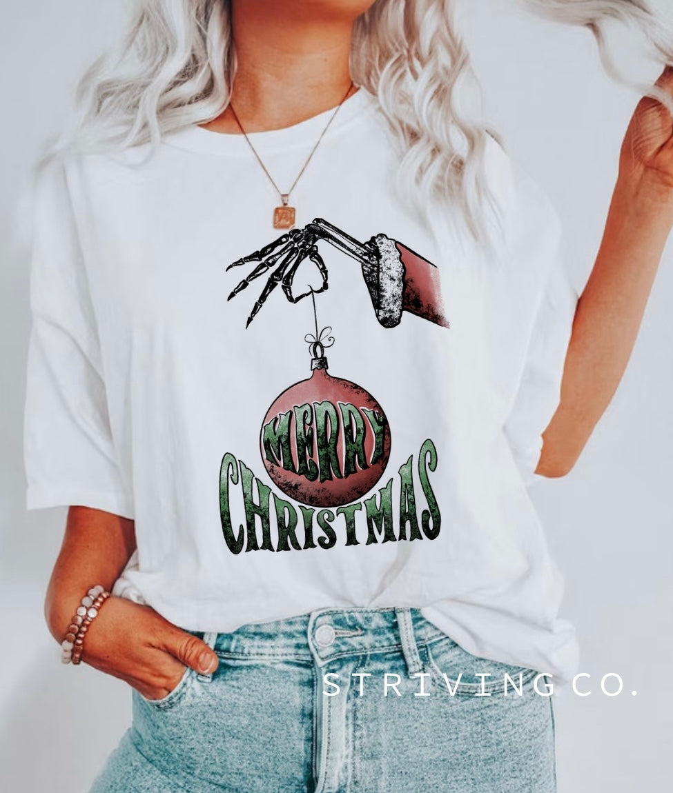 Merry Christmas skull hand + ornament tee